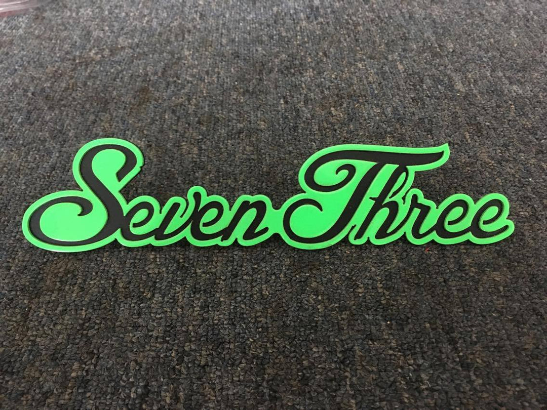 Seven Three Emblem Green on Black 1