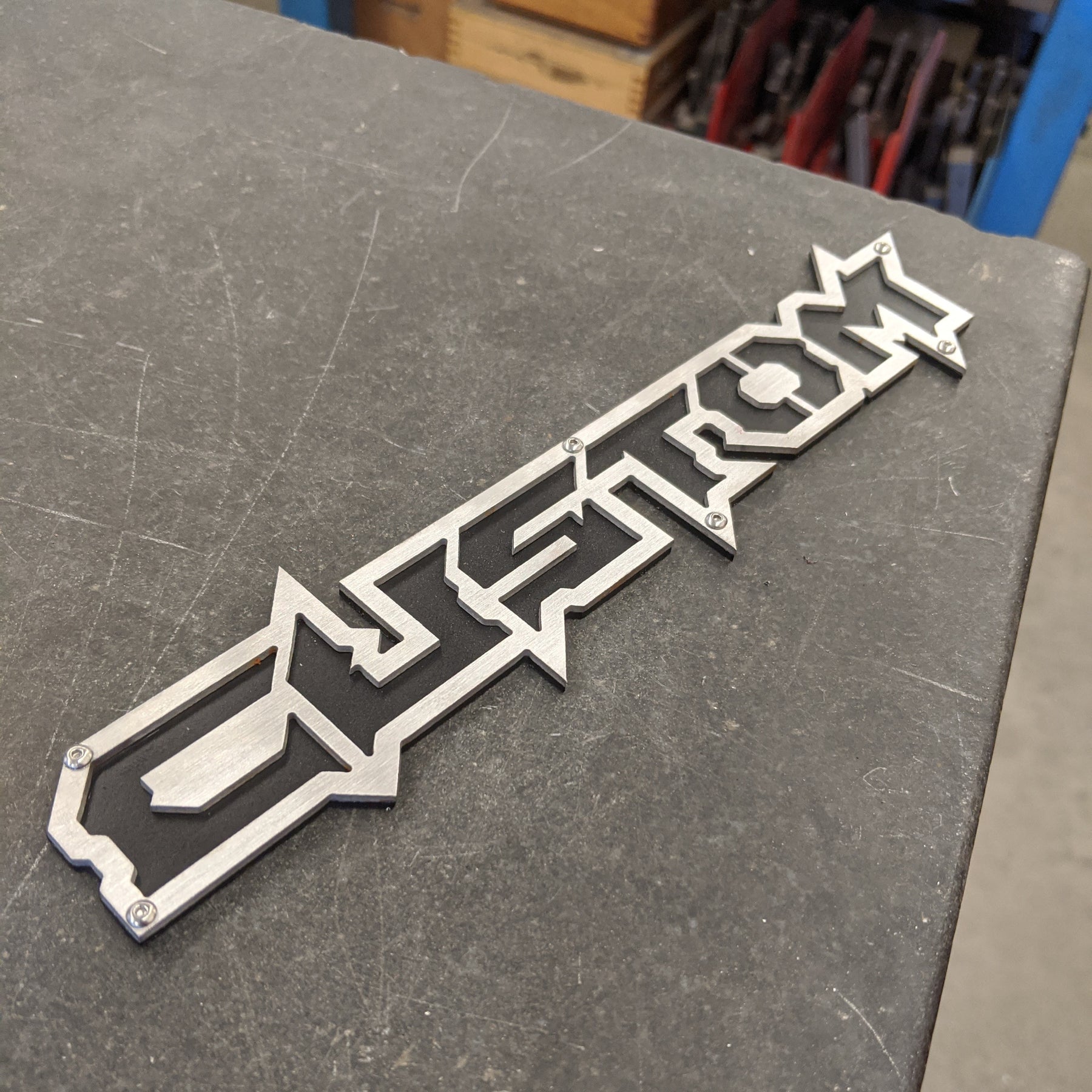 Custom Cast Emblems Custom Badge - Brushed on Black – Main Event Emblems